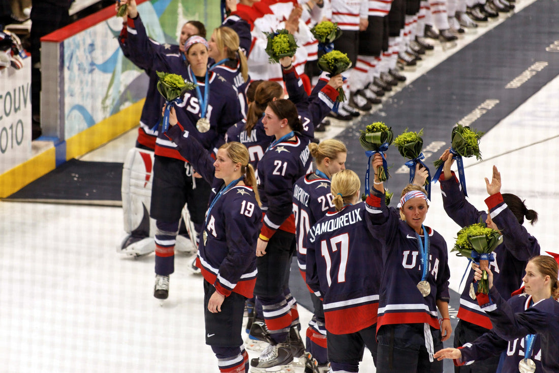 USA Women's Hockey team receiving silver medals at 2010 Winter Olympics in Vancouver